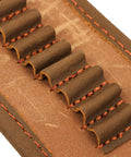 Close-up of shell slots on Canvas Leather Rifle Sling With 14 Shell Slots For 22 Caliber Ammunition Storage Heavy Duty Hunting Strap.