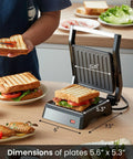 Compact Panini Press And Contact Grill With Floating Top Plate To Make Juicy Sandwiches Quickly, 5.6" x 5.3" grilling area.