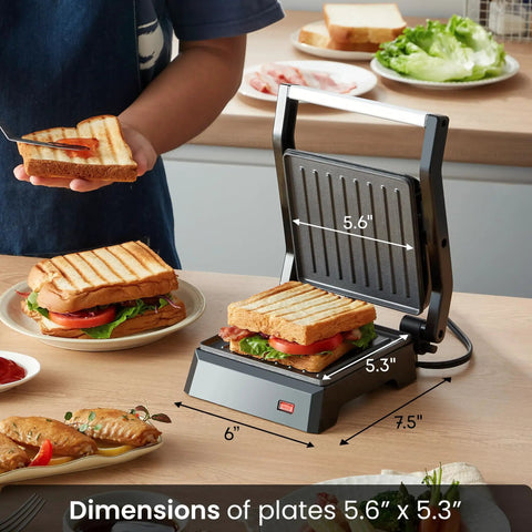 Compact Panini Press And Contact Grill With Floating Top Plate To Make Juicy Sandwiches Quickly, 5.6" x 5.3" grilling area.