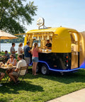 Turnkey Commercial Food Truck For High Volume Burger Stands And Mobile Catering Trailer with outdoor seating by a lake.