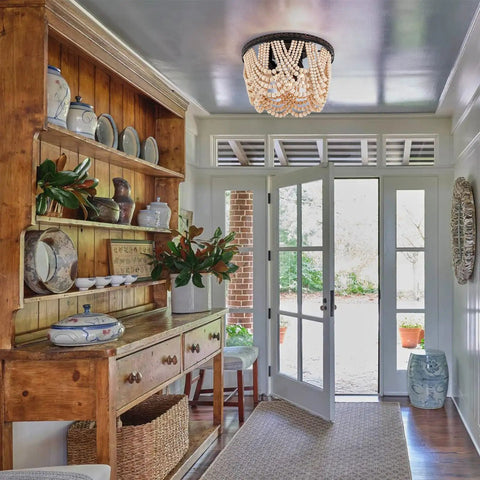 Boho Wood Beaded Chandelier Three Light Flush Mount Ceiling Fixture With Engraved Pattern Oil Rubbed Bronze in a bright foyer