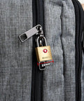 TSA Approved Luggage Padlocks 22mm Solid Brass Locks With Chrome Plated Hardened Steel Shackle on a grey suitcase zipper