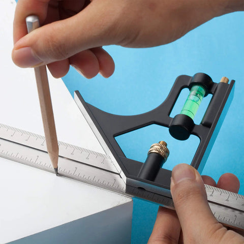 Person using Pro Grade 12 Inch Heavy Duty Combination Square Set for Carpentry and Woodworking with stainless steel blade.