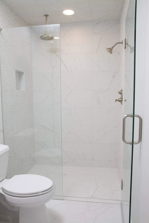 Modern shower with glass door and wall tiles illustrating a completed Standard Shower Floor Kit With Pre Pitch System No Brainer Setup Weep Protector Pan Liner Shower Drain Quick Pitch Installation DVD Kirb Perfect Components For A Leak Free DIY Shower Remodel