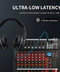 8 Channel DJ Audio Mixer With Bluetooth 5.0, USB Recording, MP3/USB Playback, Built-In Reverb, 48V Phantom Power, LED Display shown with headphones