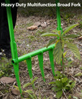 Heavy Duty Broadfork Garden Tool With Five Sharp Cambered 11 Inch Tines in action on soil outdoors, green color
