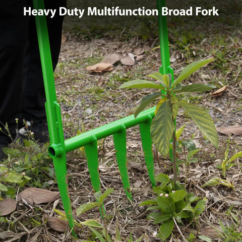 Heavy Duty Broadfork Garden Tool With Five Sharp Cambered 11 Inch Tines in action on soil outdoors, green color