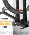 Bicycle Wheel Truing Stand For Precise Rim Alignment With Beefy Heavy Duty Base, supporting mounted bike tire.