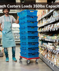 Grocery store worker with stacked blue crates on red dolly with caster wheels labeled 350lbs capacity on aisle floor.