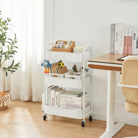 White 3-Tier Rolling Utility Cart With Caster Wheels For Kitchen And Bath No-Fuss Assembly Locking Wheels next to desk in room
