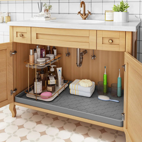 Under Sink Waterproof Silicone Cabinet Mat 34 Inch by 22 Inch, Thick Edge Protector for Kitchen and Bathroom installed in wooden cabinet.