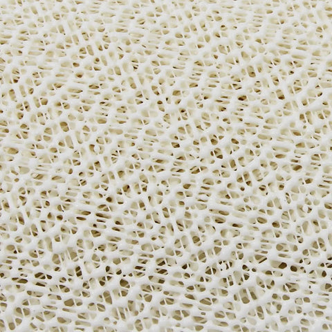 Close-up of PVC foam texture for No Slip Full Size Mattress Gripper And Rug Pad Keeps Mattress In Place And Rug From Sliding All Night Long Non Adhesive PVC Foam Anti Slip Pad For Bedroom And Living Room