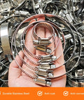 Heavy Duty 28 Piece Hose Clamp Kit With 304 Stainless Steel Worm Gear Clamps Ranging From Half Inch To Four Inches Wide For Radiators Coolant Lines Heater Pipes And Large Industrial Marine Automotive Applications That Are Super Tough, stainless hose clamps in hand