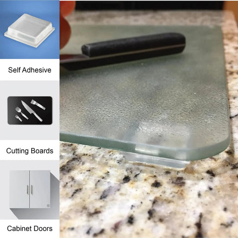 Self Adhesive 1 Inch Square Rubber Bumpers Pack Of 20 For Cutting Boards shown on a glass cutting board.