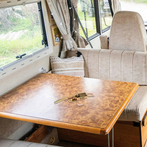 Beefy Heavy Duty Truck Trailer Gate Latch With Spring Toggle Clamp on RV table in cozy interior.