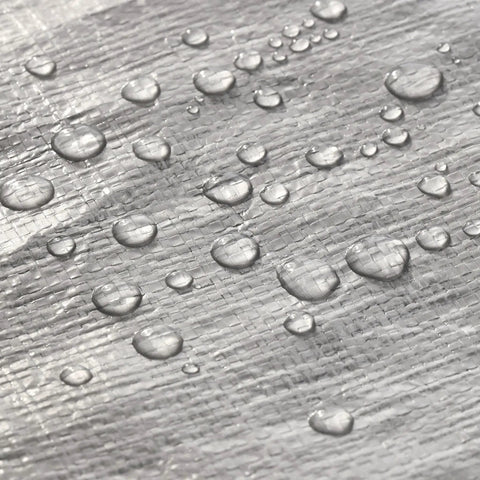 Water droplets on Built Tough Heavy Duty Poly Tarp Cover 16 Mil And 10 Mil With Grommets And Reinforced Edges 20x30 Ft