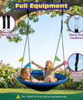 Children swinging on a Blue 48 Inch Saucer Tree Swing With Straps, Heavy Duty 600 Lb Weight Capacity, surrounded by trees.