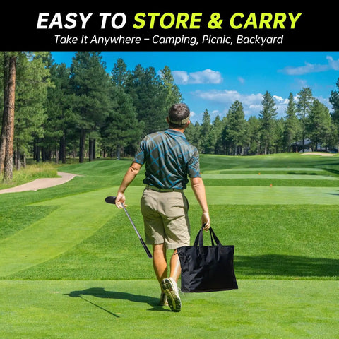 Person carrying Massive 6x6 Foot Golf Chipping Game Set With Adjustable Practice Clubs across a golf course