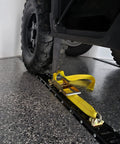 4 Pack E Track Tire Straps With 3 Rubber Blocks, 11 Ft By 2 In Ratchet Tie Downs securing tire to trailer