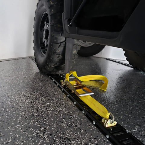 4 Pack E Track Tire Straps With 3 Rubber Blocks, 11 Ft By 2 In Ratchet Tie Downs securing tire to trailer