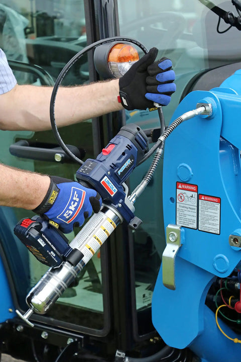 Person using PowerLuber 20V Cordless Grease Gun With 36 Inch Hose High Output 10000 PSI Trigger Operated Two Speed Battery Powered.