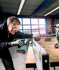 Tough As Nails Cordless Blind Rivet Gun With Brushless Motor delivers pneumatic pace in a workshop, used for precise metal joining.
