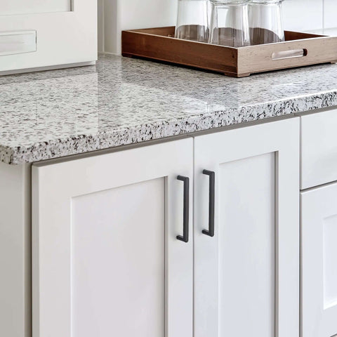 Built Tough Matte Black Cabinet Pulls And Drawer Handles With Five Inch Center To Center Rustic Industrial Kitchen furniture hardware on white cabinets.