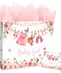13 Inch Pink Floral Baby Gift Bag With Sturdy Handles Includes Matching Card And Three Sheets Of Tissue Paper The Perfect Gift Bag For Girl Baby Showers And Kiddo Birthday Parties displayed with pink tissue paper and matching card