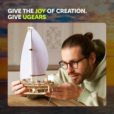 Ocean Beauty Yacht 3D Wooden Puzzle For Adults A Totally Relaxing DIY Mechanical Model Kit With Paper Sails A Brain Teaser Building Set For Home Office Decor And Shelf Display, man holding wooden sailboat model