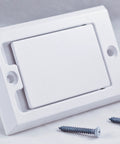 Angled front view of a white central vacuum wall inlet with square door and two screws.