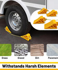 Two Pair Wheel Chocks With Rope And Easy Carry Handle For Travel Trailers Cars Campers Trucks And RVs Non Slip Bright Yellow Lightweight Wheel Chocks For Safe Parking shown installed on RV wheel on pavement.