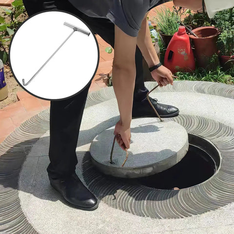 Man using Heavy Duty Manhole Cover Hook With T Shaped Handle 15 Inch Pull Tool for lifting a sewer cover