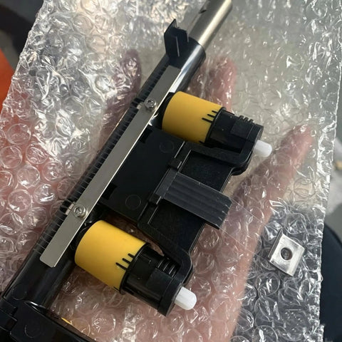 Bulletproof Toggle Bar And Lift Strap Set For ZT410 And ZT411 Thermal Label Printers, black mechanism with yellow rollers.