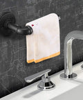 Industrial Pipe Toilet Paper Holder In Matte Black Built To Last Boss Style DIY Vintage Rustic Iron Wall Mount Roll Tissue Holder Towel Rack With Hardware For Bathroom Kitchen Bedroom Hallway displaying a white towel above a sink faucet.