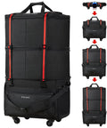 Front view of black Mixi expandable travel bag with red compression straps, wheels, and shoulder strap.