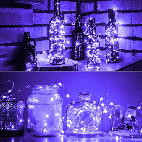 Battery Operated Copper Wire Fairy Lights 16.4Ft UV Black Light LED String With 50 LEDs illuminating bottles and jars in UV glow