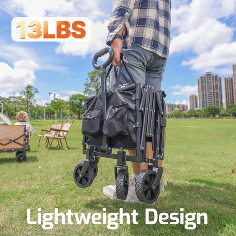 Person carrying a black collapsible wagon cart with 350lb load, expandable 100L storage, double bearing steering in a park