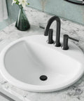 Ready To Rock 19 Inch Round Drop In Bathroom Sink Crafted From Premium Vitreous China Featuring Pre Drilled Faucet Holes Rear Drain Overflow Guard And Crisp White Tone For Your Bathroom on marble countertop.