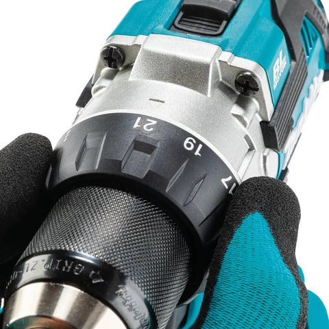 Brushless 18V Cordless Drill Driver With 13Mm Keyless Chuck And Dual Speed Gearing control dial close-up in gloved hand.