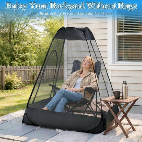 One Person Pop Up Mosquito Net Tent With Mesh Shelter, Instant No Fuss One Second Setup, in backyard with seated person.