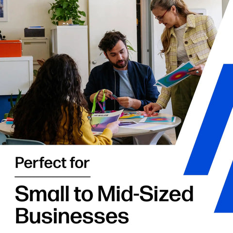 Office team collaborating with colorful documents, highlighting solutions for small to mid-sized businesses.