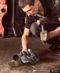 Mechanic using White 100 Percent Cotton Shop Towels 500 Count Heavy Duty Commercial Industrial B Grade 14 By 15 Inches