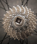 Cassette hub close-up showing Shimano And Sram Cassette Lockring Tool For Quick Hassle Free Install And Removal Of 12 Internal Spline Cassettes