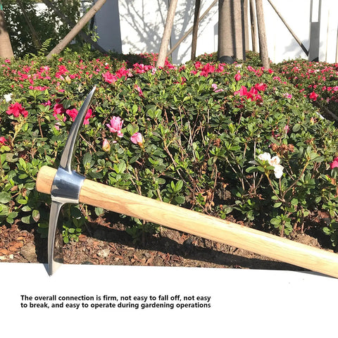 Stainless Steel Hand Tiller And Cultivator Garden Tool With Hardwood Handle for Digging and Weeding in vegetable gardens, leaning in a garden.
