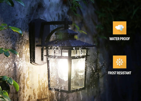 Modern Black Exterior Porch Light Wall Mount Lantern in rain showing waterproof and frost-resistant features.