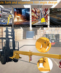 Heavy Hitter Telescoping Forklift Jib Boom Crane Attachment showcasing adjustable tilt and dual forks in a warehouse environment.