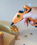 Using Clear Mini Hot Glue Sticks 4 Inch Long 0.27 Inch Diameter Pack Of 6 75 Count Per Pack for crafting with a glue gun