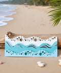 Beach Wave Metal Cutting Dies Set For Scrapbooking And Card Making on tropical beach sand