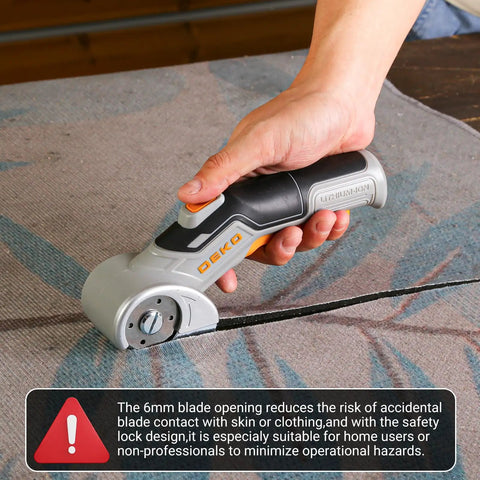 User operating DEKOPRO 4v Cordless Electric Scissors With Safety Lock on carpet material for precise cutting.