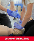 Adult and infant CPR mask kit with bag-valve-mask and gloves on a CPR training mannequin